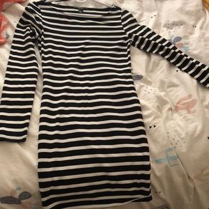 A black and white body con dress